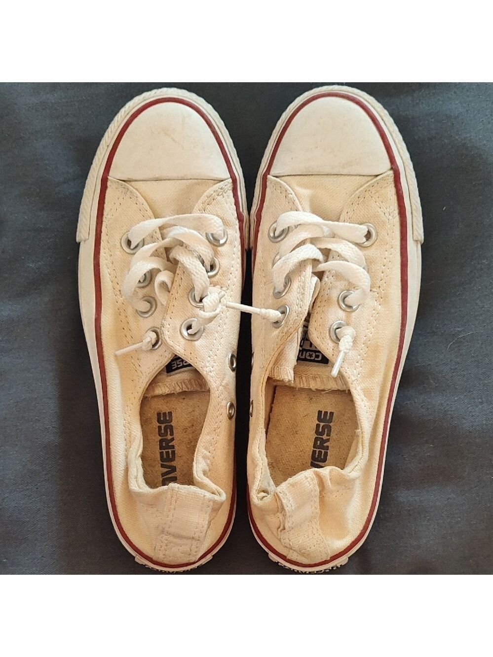 Converse Off-White Canvas Sneakers with Red Trim